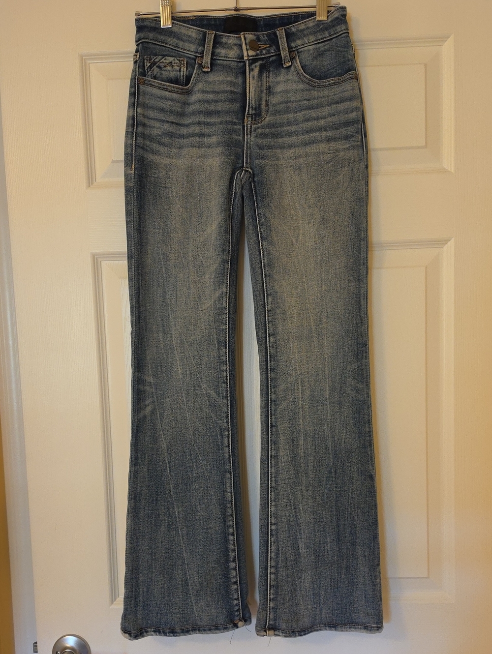Buckle Black Light Wash Blue Flare Jeans